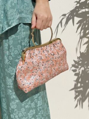 Bolso de mano coral lentejuelas